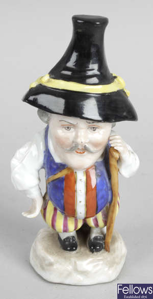 A 19th century porcelain Mansion House Dwarf figurine.