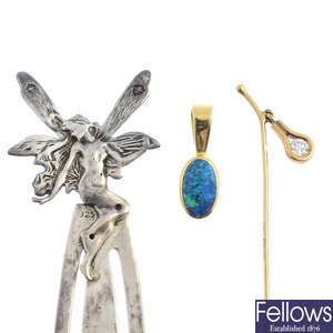 A 9ct gold diamond tie pin, an opal triplet pendant and a bookmark.