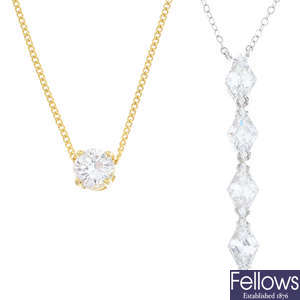 Two 14ct gold cubic zirconia pendants, with chain.