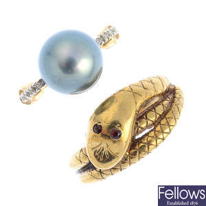A 9ct gold garnet snake ring and a 9ct gold cultured pearl and diamond dress ring.