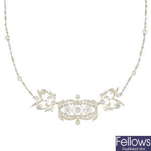 An early 20th century silver and gold diamond necklace.