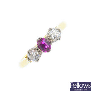 An 18ct gold synthetic ruby and diamond three-stone ring.