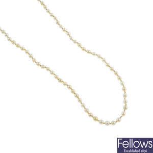 An early 20th century seed pearl single-strand necklace.