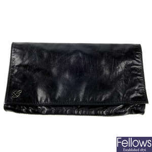 GUCCI - a black leather envelope clutch.