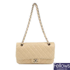 CHANEL - a cream Medium Classic Double Flap handbag.