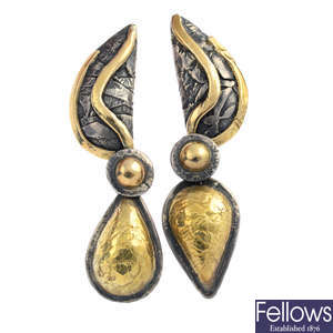 EILEEN COYNE - a pair of earrings.