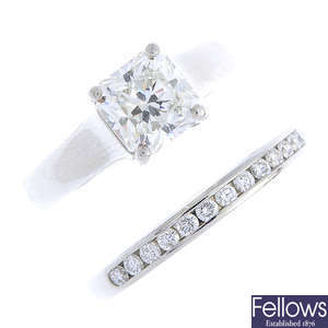 TIFFANY & CO. - a diamond single-stone ring and half eternity ring.