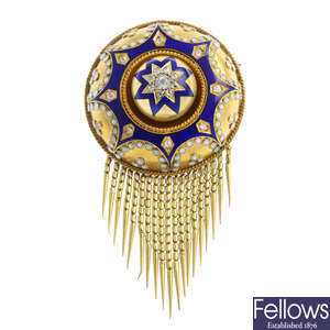 A late Victorian gold, diamond and enamel fringed brooch.
