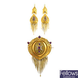 A mid Victorian gold ruby and split pearl suite.