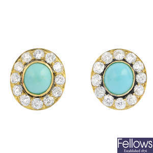 A pair of turquoise and diamond cluster earrings.