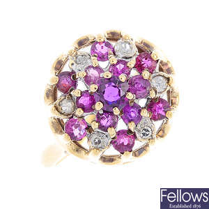 A 9ct gold ruby and diamond cluster ring and a 9ct gold locket.