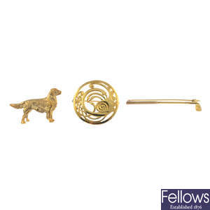 Three 9ct gold brooches.