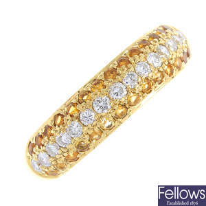 An 18ct gold diamond and citrine band ring.