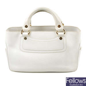 CÉLINE - a white grained leather Boogie handbag.