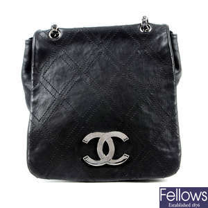 CHANEL - a black full flap crossbody handbag.