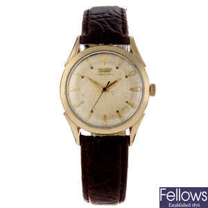 TISSOT - a gentleman's gold plated wrist watch with another Tissot watch.