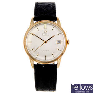 OMEGA - a gentleman's 9ct yellow gold Genève wrist watch.