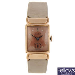BULOVA - a mid-size rolled gold wrist watch.