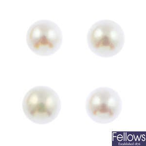 Two pairs of cultured pearl earrings and a single earring.