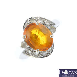 An 18ct gold orange sapphire and gem-set dress ring.