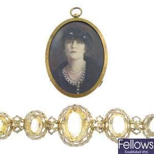 An early 20th century citrine bracelet and a portrait pendant.