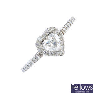 A palladium diamond heart cluster ring.