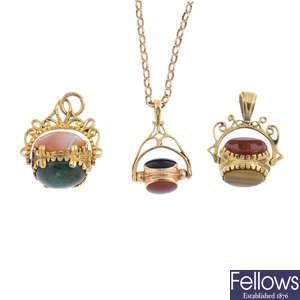 Three 9ct gold gem-set swivel fobs and a 9ct gold chain.