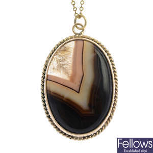 An early 20th century 9ct carnelian fob and and an agate pendant, with chain.