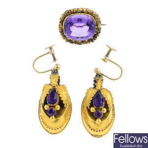 A pair of mid Victorian gold amethyst earrings and a brooch.
