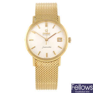 OMEGA - a gentleman's 18ct yellow gold Seamaster bracelet watch.
