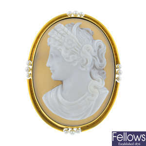 An early 20th century gold agate cameo and seed pearl brooch.