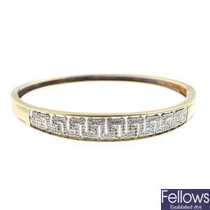 A 9ct gold diamond ring and a bangle.