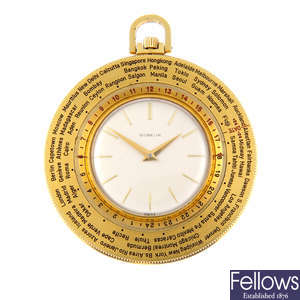 A gold plated open face World Time pocket watch by Gubelin.