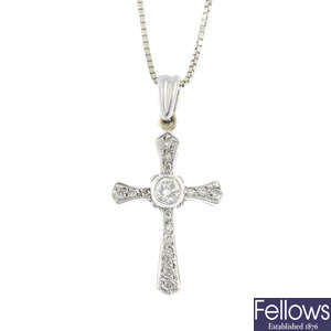 A 9ct gold diamond cross pendant, with a 9ct gold chain.
