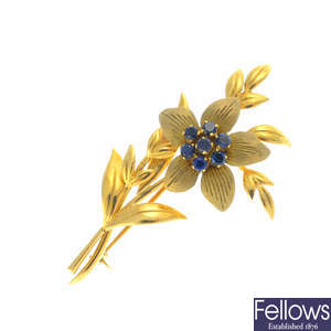 An 18ct gold sapphire floral brooch.