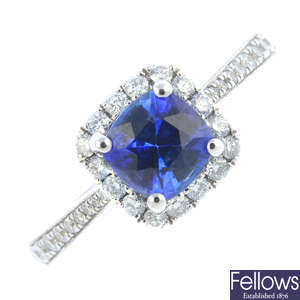 A sapphire and diamond cluster ring.