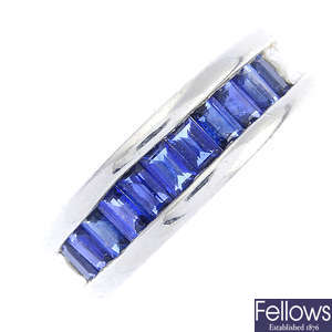 A sapphire band ring.