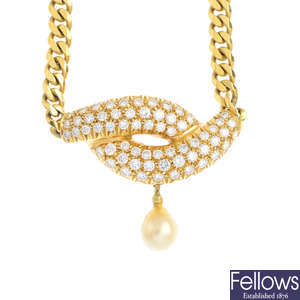A diamond and pearl necklace.