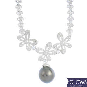 A cultured pearl and diamond floral necklace.
