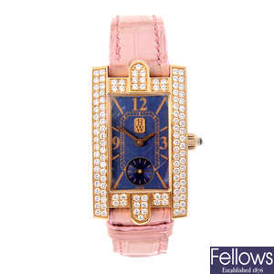 HARRY WINSTON - a lady's 18ct rose gold wrist watch.