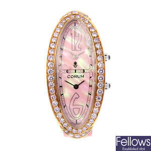 CORUM - a limited edition lady's 18ct gold Millennium wrist watch.