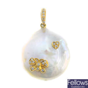 A baroque cultured pearl and diamond pendant.