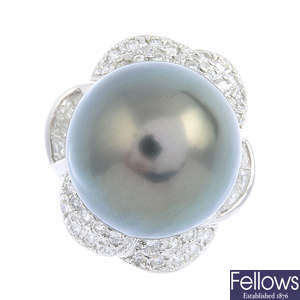 A cultured pearl and diamond floral dress ring.