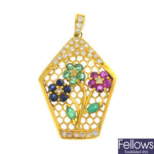 A diamond, emerald, ruby and sapphire floral pendant.