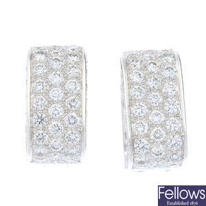 ADLER - a pair of 18ct gold diamond earrings.