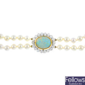 A reversible opal/black opal and diamond, cultured pearl two-row bracelet.