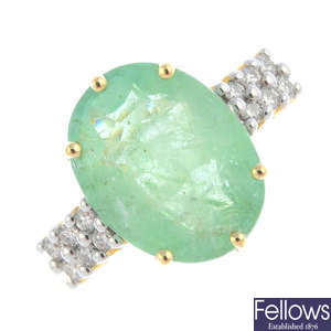 A 14ct gold emerald and diamond ring.