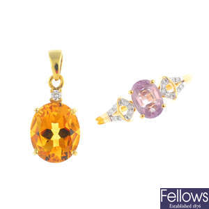 An 18ct gold sapphire and diamond ring and an 18ct gold citrine and diamond pendant.