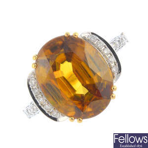 An 18ct gold sphene and diamond ring.