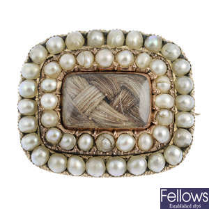 A mid Victorian gold pearl mourning brooch.